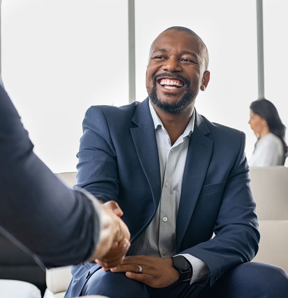african-amercian-male-laughing-in-business-meeting